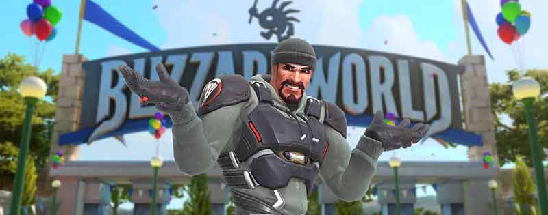Reaper from Overwatch shrugging in front of the Blizzard World sign - Writing by GamerZakh