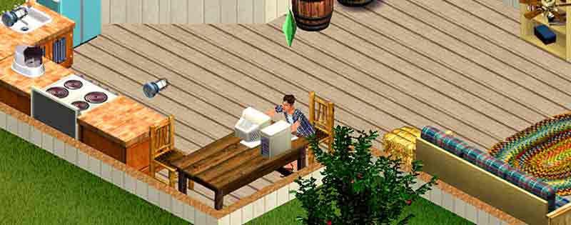 A character from The Sims 1 sitting at home on the computer - Writing by GamerZakh